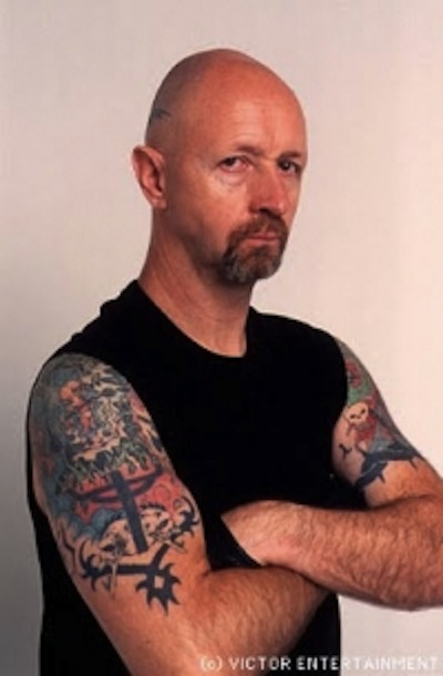 Black and grey Judas Priest's Rob Halford tattoo on the